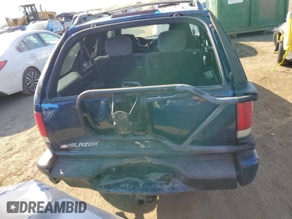 2001 Chevrolet Blazer LS с VIN 1GNCT18W91K189599, выставлен на аукционе Copart как лот 74595674 с пробегом 208 309 миль миль и Списание • Salvage title. История ставок и продаж доступна на DreamBid. Изображение 6.