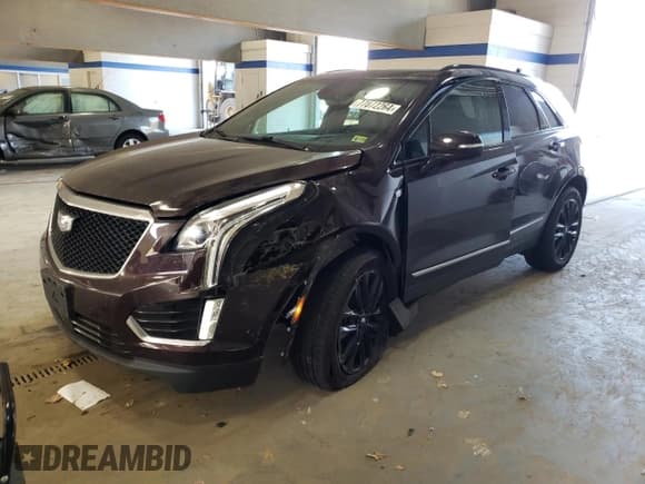✅ 2021 Cadillac XT5 AWD Sport • VIN: 1GYKNGRS5MZ165836 • Lot: 77872264. Listed on Copart with 46,065 mi. Free auction sales archive from the USA and detailed vehicle history report at DreamBid. Image 1.