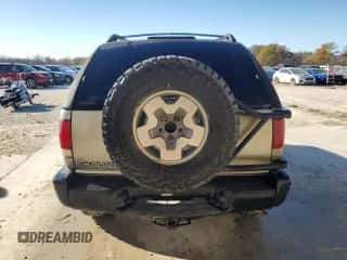 2002 Chevrolet Blazer LS z VIN 1GNCT18W72K114367, wystawiony jako Copart lot #79573024 z przebiegiem 142 872 mil mil oraz Szkoda całkowita • Salvage title. Historia ofert i sprzedaży dostępna na DreamBid. Obrazek 6.