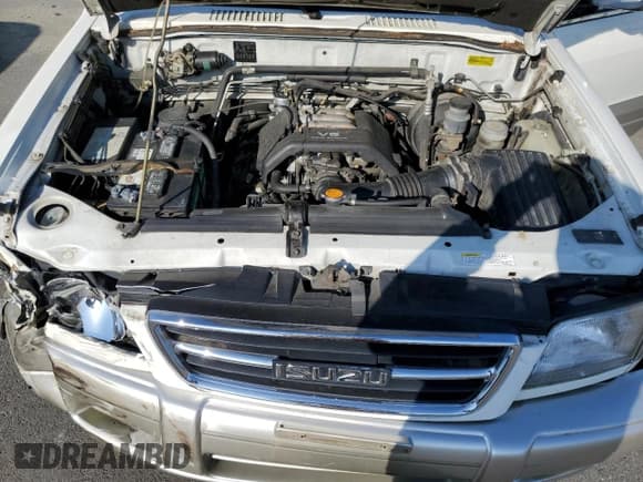 ✅ 1998 Isuzu Trooper S • VIN: JACDJ58X4W7915462 • Lot: 45632975. Listed on Copart with 135,215 mi. Free auction sales archive from the USA and detailed vehicle history report at DreamBid. Image 12.