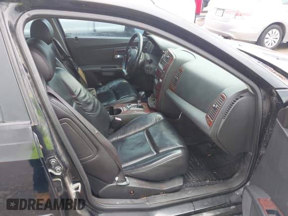 ✅ 2006 Cadillac CTS • VIN: 1G6DM57T360193906 • Lot: 42490588. Wystawiony na IAAI z przebiegiem 223 056 mil. Bezpłatny archiwum sprzedaży aukcyjnych z USA i szczegółowy raport historii pojazdu na DreamBid. Zdjęcie 5.