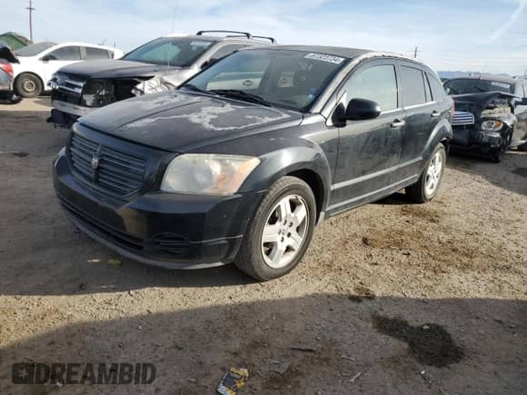 2008 Dodge Caliber SE with VIN 1B3HB28CX8D770378, listed as a Copart auction lot 87323734 with 171,414 mi miles and Salvage title. Bid and sale history available at DreamBid. Image 1.