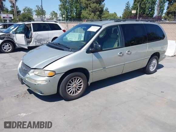 ✅ 1999 Chrysler Town & Country LX • VIN: 1C4GP54L1XB864596 • Lot: 42753995. Listed on IAAI with Not provided. Free auction sales archive from the USA and detailed vehicle history report at DreamBid. Image 2.