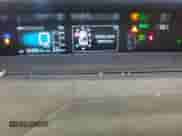 2021 Toyota Prius L Eco с VIN JTDKAMFU5M3143781, выставлен на аукционе Copart как лот 81028565 с пробегом 52 355 миль миль и Списание • Salvage title. История ставок и продаж доступна на DreamBid. Изображение 9.