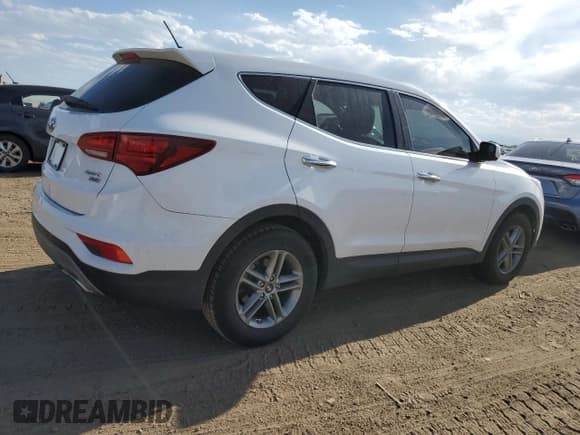 ✅ 2018 Hyundai Santa Fe 2.4L • VIN: 5XYZTDLB0JG553584 • Лот: 59476674. Опубликован ранее на Copart с пробегом 102 438 миль. Бесплатный доступ к архиву аукционных продаж из США и подробный отчёт об истории автомобиля на DreamBid. Изображение 3.