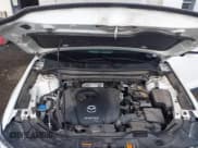 ✅ 2023 Mazda CX-5 S Carbon Edition • VIN: JM3KFBCM9P0125887 • Лот: 43320007. Опубликован ранее на IAAI с пробегом 52 626 миль. Бесплатный доступ к архиву аукционных продаж из США и подробный отчёт об истории автомобиля на DreamBid. Изображение 10.