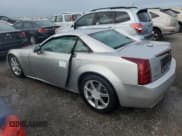 ✅ 2004 Cadillac XLR • VIN: 1G6YV34A545602056 • Lot: 66506514. Wystawiony na Copart z przebiegiem Nie podano. Bezpłatny archiwum sprzedaży aukcyjnych z USA i szczegółowy raport historii pojazdu na DreamBid. Zdjęcie 2.