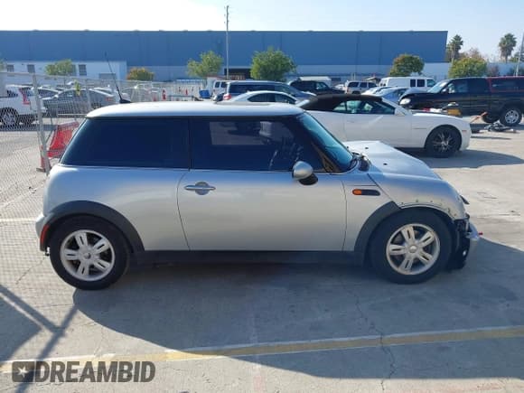 ✅ 2006 MINI Hardtop • VIN: WMWRC33536TJ79002 • Lot: 43794333. Listed on IAAI with 150,511 mi. Free auction sales archive from the USA and detailed vehicle history report at DreamBid. Image 13.