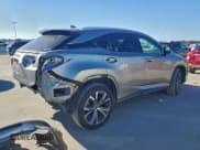 ✅ 2022 Lexus RX 350 • VIN: 2T2HZMDAXNC324133 • Lot: 91471065. Listed on Copart with 74,518 mi. Free auction sales archive from the USA and detailed vehicle history report at DreamBid. Image 3.