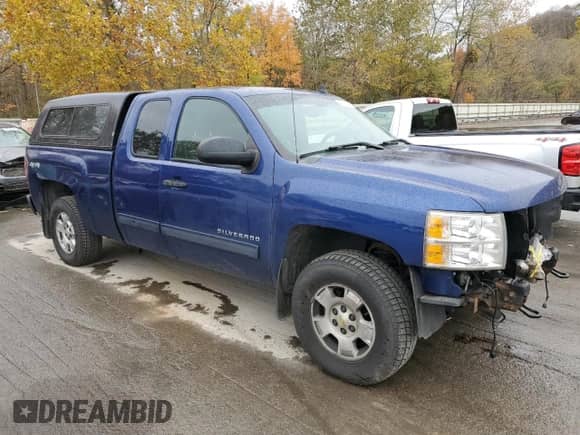 2013 Chevrolet Silverado 1500 LT with VIN 1GCRKSE7XDZ380761, listed as a Copart auction lot 90489615 with 212,110 mi miles and Salvage title. Bid and sale history available at DreamBid. Image 4.