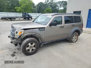 ✅ 2007 Dodge Nitro SXT • VIN: 1D8GT28K77W619372 • Lot: 64211575. Wystawiony na Copart z przebiegiem 241 013 mil. Bezpłatny archiwum sprzedaży aukcyjnych z USA i szczegółowy raport historii pojazdu na DreamBid. Zdjęcie 1.