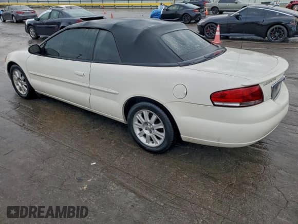 ✅ 2005 Chrysler Sebring GTC • VIN: 1C3EL75R55N549740 • Lot: 93539275. Listed on Copart with 109,011 mi. Free auction sales archive from the USA and detailed vehicle history report at DreamBid. Image 2.