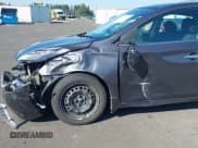 ✅ 2014 Nissan Sentra S • VIN: 1N4AB7AP4EN853827 • Lot: 43297658. Listed on IAAI with 139,561 mi. Free auction sales archive from the USA and detailed vehicle history report at DreamBid. Image 6.