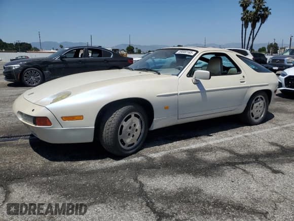✅ 1988 Porsche 928 • VIN: WP0JB0927JS860826 • Lot: 59000165. Listed on Copart with 56,317 mi. Free auction sales archive from the USA and detailed vehicle history report at DreamBid. Image 1.