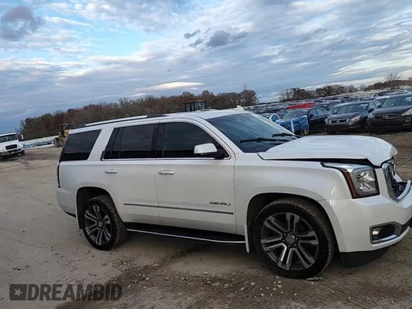 ✅ 2017 GMC Yukon Denali • VIN: 1GKS2CKJ2HR371411 • Lot: 91143895. Wystawiony na Copart z przebiegiem 146 227 mil. Bezpłatny archiwum sprzedaży aukcyjnych z USA i szczegółowy raport historii pojazdu na DreamBid. Zdjęcie 14.