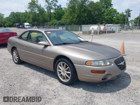 ✅ 1999 Chrysler Sebring LXi • VIN: 4C3AU52N0XE110884 • Lot: 42463909. Listed on IAAI with 100,762 mi. Free auction sales archive from the USA and detailed vehicle history report at DreamBid. Image 1.