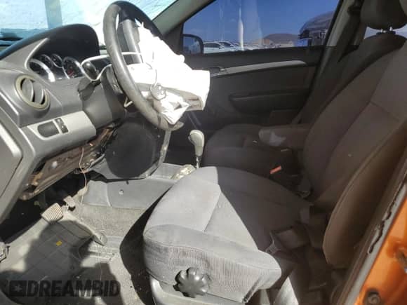 2007 Chevrolet Aveo LS z VIN KL1TD56617B146360, wystawiony jako Copart lot #75254624 z przebiegiem 147 108 mil mil oraz Szkoda całkowita • Salvage title. Historia ofert i sprzedaży dostępna na DreamBid. Obrazek 7.