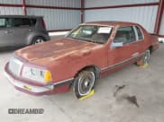 ✅ 1984 Ford Thunderbird • VIN: 1FABP4630EA111572 • Lot: 41569309. Listed on IAAI with 7,919 mi. Free auction sales archive from the USA and detailed vehicle history report at DreamBid. Image 2.