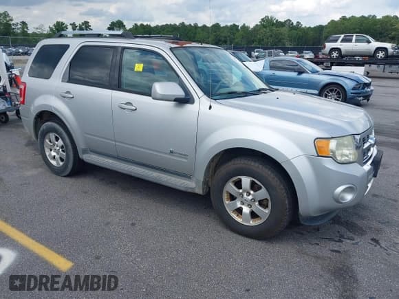 ✅ 2009 Ford Escape Hybrid • VIN: 1FMCU49399KB18857 • Lot: 42502324. Wystawiony na IAAI z przebiegiem 227 828 mil. Bezpłatny archiwum sprzedaży aukcyjnych z USA i szczegółowy raport historii pojazdu na DreamBid. Zdjęcie 1.