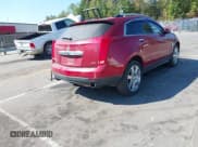 ✅ 2012 Cadillac SRX Performance Collection • VIN: 3GYFNBE31CS571210 • Lot: 43251543. Listed on IAAI with 186,568 mi. Free auction sales archive from the USA and detailed vehicle history report at DreamBid. Image 4.