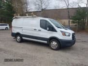✅ 2020 Ford Transit Cargo • VIN: 1FTBR2YG6LKB18798 • Lot: 43521187. Listed on IAAI with 114,451 mi. Free auction sales archive from the USA and detailed vehicle history report at DreamBid. Image 1.