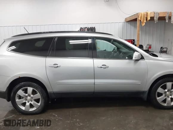 ✅ 2013 Chevrolet Traverse LTZ • VIN: 1GNKVLKDXDJ139698 • Lot: 43635000. Wystawiony na IAAI z przebiegiem 133 377 mil. Bezpłatny archiwum sprzedaży aukcyjnych z USA i szczegółowy raport historii pojazdu na DreamBid. Zdjęcie 13.