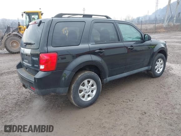 ✅ 2011 Mazda Tribute Grand Touring • VIN: 4F2CY9GG9BKM04841 • Lot: 41678924. Listed on IAAI with 180,424 mi. Free auction sales archive from the USA and detailed vehicle history report at DreamBid. Image 4.