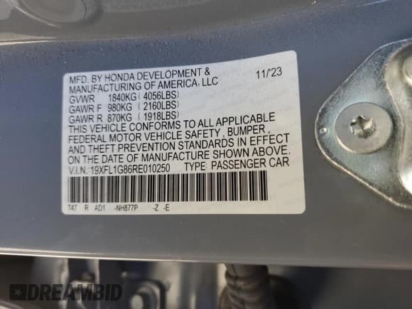 ✅ 2024 Honda Civic Sport Touring • VIN: 19XFL1G86RE010250 • Lot: 65923865. Listed on Copart with 21,755 mi. Free auction sales archive from the USA and detailed vehicle history report at DreamBid. Image 14.