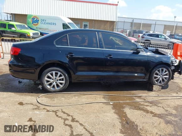 ✅ 2013 Volkswagen Jetta SE • VIN: 3VWDP7AJ3DM438668 • Lot: 42235014. Wystawiony na IAAI z przebiegiem 128 406 mil. Bezpłatny archiwum sprzedaży aukcyjnych z USA i szczegółowy raport historii pojazdu na DreamBid. Zdjęcie 13.