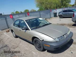 1996 Saturn SL with VIN 1G8ZH5288TZ230864, listed as a IAAI auction lot 42116703 with 104,387 mi miles and . Bid and sale history available at DreamBid. Image 1.