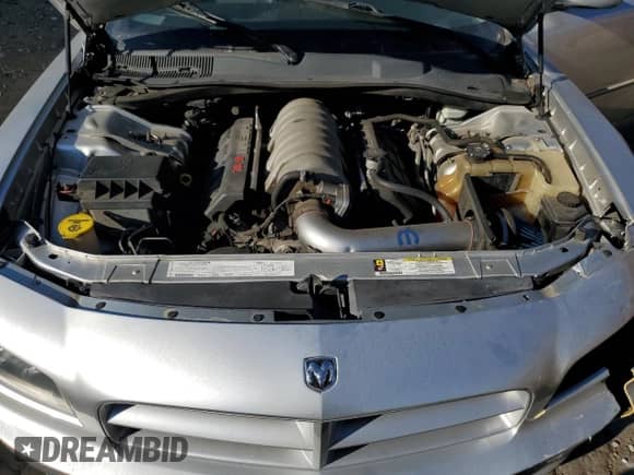 2007 Dodge Charger SRT-8 с VIN 2B3LA73W17H787535, выставлен на аукционе Copart как лот 78386124 с пробегом 173 263 миль миль и Списание • Salvage title. История ставок и продаж доступна на DreamBid. Изображение 11.