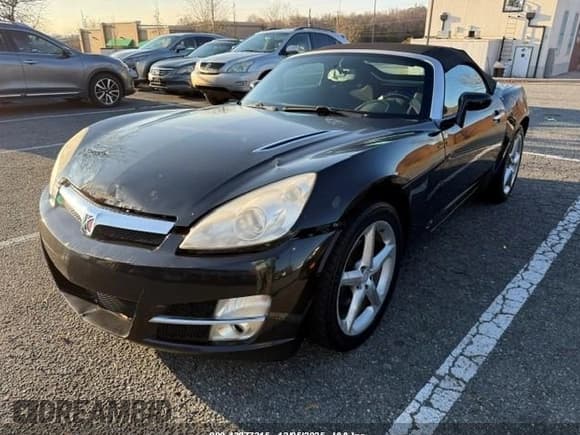 ✅ 2008 Saturn Sky • VIN: 1G8MB35B28Y112393 • Lot: 43877315. Listed on IAAI with 198,499 mi. Free auction sales archive from the USA and detailed vehicle history report at DreamBid. Image 2.