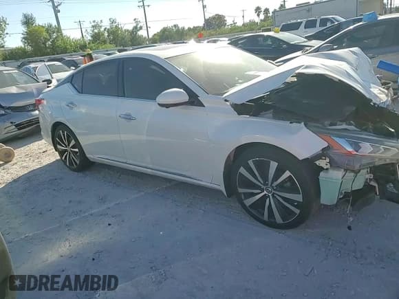 ✅ 2019 Nissan Altima Platinum • VIN: 1N4BL4FVXKC116937 • Лот: 89697565. Опубликован ранее на Copart с пробегом Не указан. Бесплатный доступ к архиву аукционных продаж из США и подробный отчёт об истории автомобиля на DreamBid. Изображение 14.