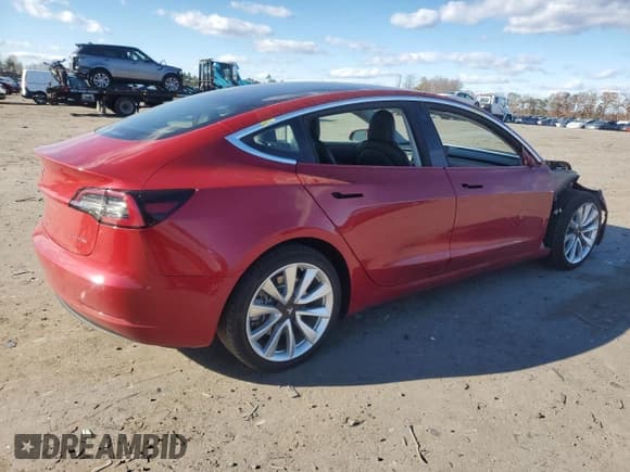 ✅ 2018 Tesla Model 3 Long Range Battery • VIN: 5YJ3E1EB6JF146131 • Lot: 92086685. Listed on Copart with 122,145 mi. Free auction sales archive from the USA and detailed vehicle history report at DreamBid. Image 3.