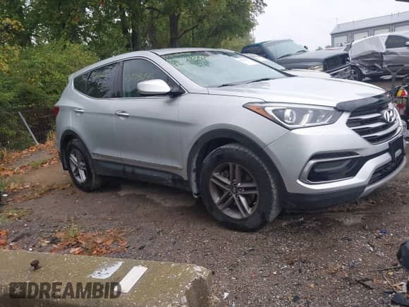 2017 Hyundai Santa Fe 2.4L z VIN 5XYZT3LB1HG437508, wystawiony jako IAAI lot #43278655 z przebiegiem 104 863 mil mil oraz . Historia ofert i sprzedaży dostępna na DreamBid. Obrazek 1.