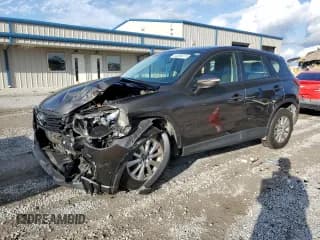 ✅ 2016 Mazda CX-5 Sport • VIN: JM3KE2BY5G0632387 • Lot: 85386075. Wystawiony na Copart z przebiegiem 84 944 mil. Bezpłatny archiwum sprzedaży aukcyjnych z USA i szczegółowy raport historii pojazdu na DreamBid. Zdjęcie 1.