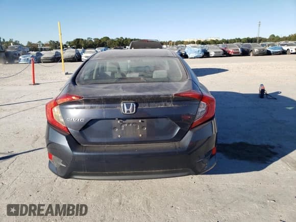 ✅ 2016 Honda Civic LX • VIN: 19XFC2F54GE239889 • Лот: 92425235. Опубликован ранее на Copart с пробегом 72 347 миль. Бесплатный доступ к архиву аукционных продаж из США и подробный отчёт об истории автомобиля на DreamBid. Изображение 6.