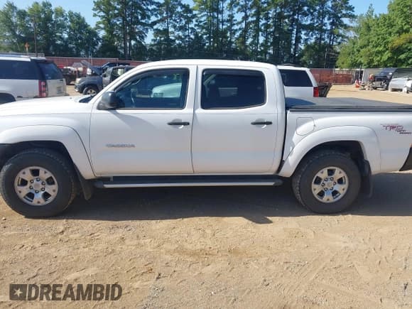 ✅ 2011 Toyota Tacoma PreRunner • VIN: 5TFJU4GN4BX005312 • Lot: 42840848. Listed on IAAI with 155,049 mi. Free auction sales archive from the USA and detailed vehicle history report at DreamBid. Image 14.