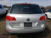 ✅ 2013 Volkswagen Touareg Exec • VIN: WVGEF9BP6DD011274 • Lot: 50680105. Listed on Copart with 96,336 mi. Free auction sales archive from the USA and detailed vehicle history report at DreamBid. Image 6.