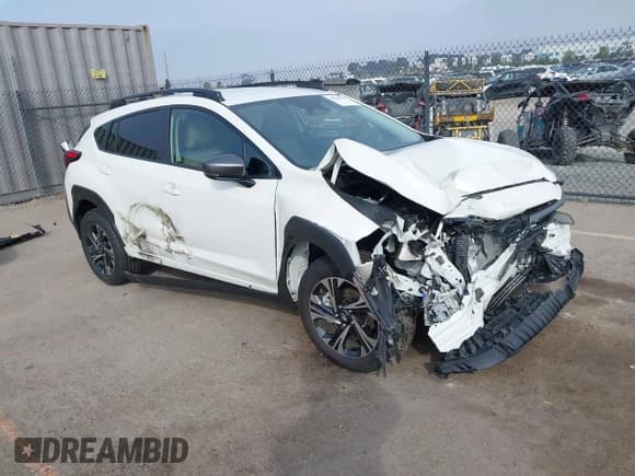 ✅ 2024 Subaru Crosstrek Premium • VIN: JF2GUADC4R8899152 • Lot: 43604572. Listed on IAAI with 5,871 mi. Free auction sales archive from the USA and detailed vehicle history report at DreamBid. Image 1.