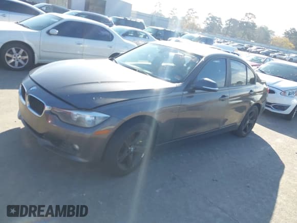 ✅ 2012 BMW 3 Series 328i • VIN: WBA3A5C56CF341738 • Lot: 43852680. Listed on IAAI with 296,924 mi. Free auction sales archive from the USA and detailed vehicle history report at DreamBid. Image 2.
