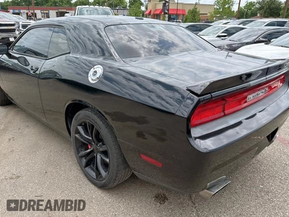✅ 2012 Dodge Challenger SRT-8 392 • VIN: 2C3CDYCJ8CH137762 • Lot: 59003275. Wystawiony na Copart z przebiegiem 85 412 mil. Bezpłatny archiwum sprzedaży aukcyjnych z USA i szczegółowy raport historii pojazdu na DreamBid. Zdjęcie 3.