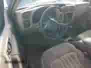 1999 Chevrolet S-10 LS с VIN 1GCCS19X7XK189242, выставлен на аукционе Copart как лот 77129404 с пробегом 208 281 миль миль и Списание • Salvage title. История ставок и продаж доступна на DreamBid. Изображение 8.