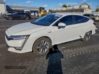 ✅ 2018 Honda Clarity Touring • VIN: JHMZC5F37JC004252 • Lot: 91730235. Wystawiony na Copart z przebiegiem 181 506 mil. Bezpłatny archiwum sprzedaży aukcyjnych z USA i szczegółowy raport historii pojazdu na DreamBid. Zdjęcie 1.