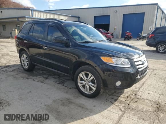 ✅ 2012 Hyundai Santa Fe Limited • VIN: 5XYZKDAGXCG110864 • Lot: 79948054. Listed on Copart with 127,810 mi. Free auction sales archive from the USA and detailed vehicle history report at DreamBid. Image 4.