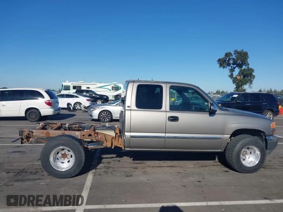 ✅ 2001 GMC Sierra 1500 SLE • VIN: 1GTEK19T21E189502 • Лот: 42865607. Опубликован ранее на IAAI с пробегом 229 087 миль. Бесплатный доступ к архиву аукционных продаж из США и подробный отчёт об истории автомобиля на DreamBid. Изображение 14.