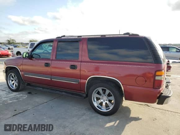 2002 Chevrolet Suburban LT z VIN 1GNEC16ZX2J211803, wystawiony jako Copart lot #78825824 z przebiegiem 267 175 mil mil oraz Czysty tytuł • Clean title. Historia ofert i sprzedaży dostępna na DreamBid. Obrazek 2.