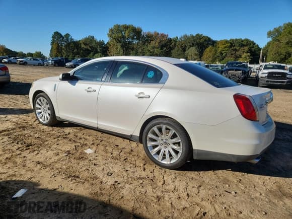 ✅ 2011 Lincoln MKS • VIN: 1LNHL9DR6BG615164 • Lot: 90116955. Listed on Copart with 125,837 mi. Free auction sales archive from the USA and detailed vehicle history report at DreamBid. Image 2.