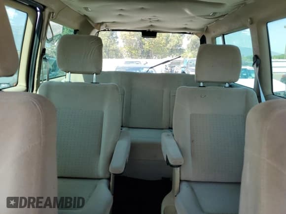 ✅ 2003 Volkswagen EuroVan GLS • VIN: WV2KB47043H001319 • Lot: 73758024. Listed on Copart with 88,497 mi. Free auction sales archive from the USA and detailed vehicle history report at DreamBid. Image 10.