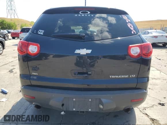 2012 Chevrolet Traverse LTZ with VIN 1GNKVLED7CJ270162, listed as a Copart auction lot 68444625 with 140,491 mi miles and Clean title. Bid and sale history available at DreamBid. Image 6.